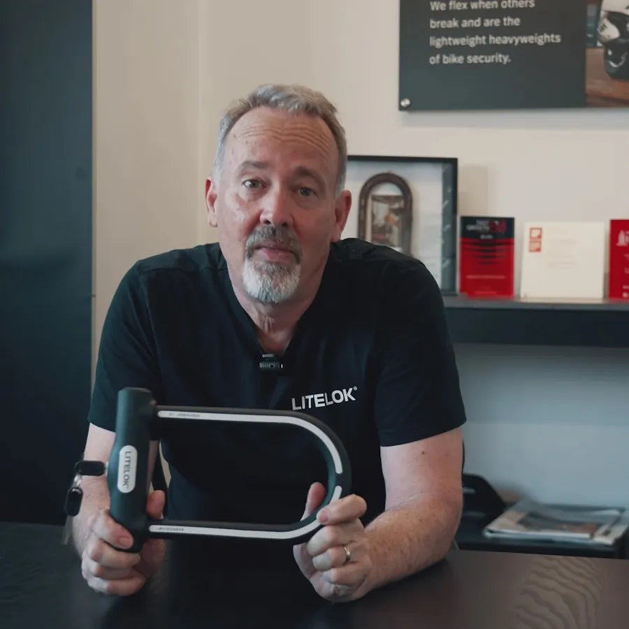 Neil Barron, LITELOK founder, holding an X1